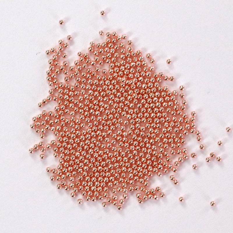 Billes or rose sphère